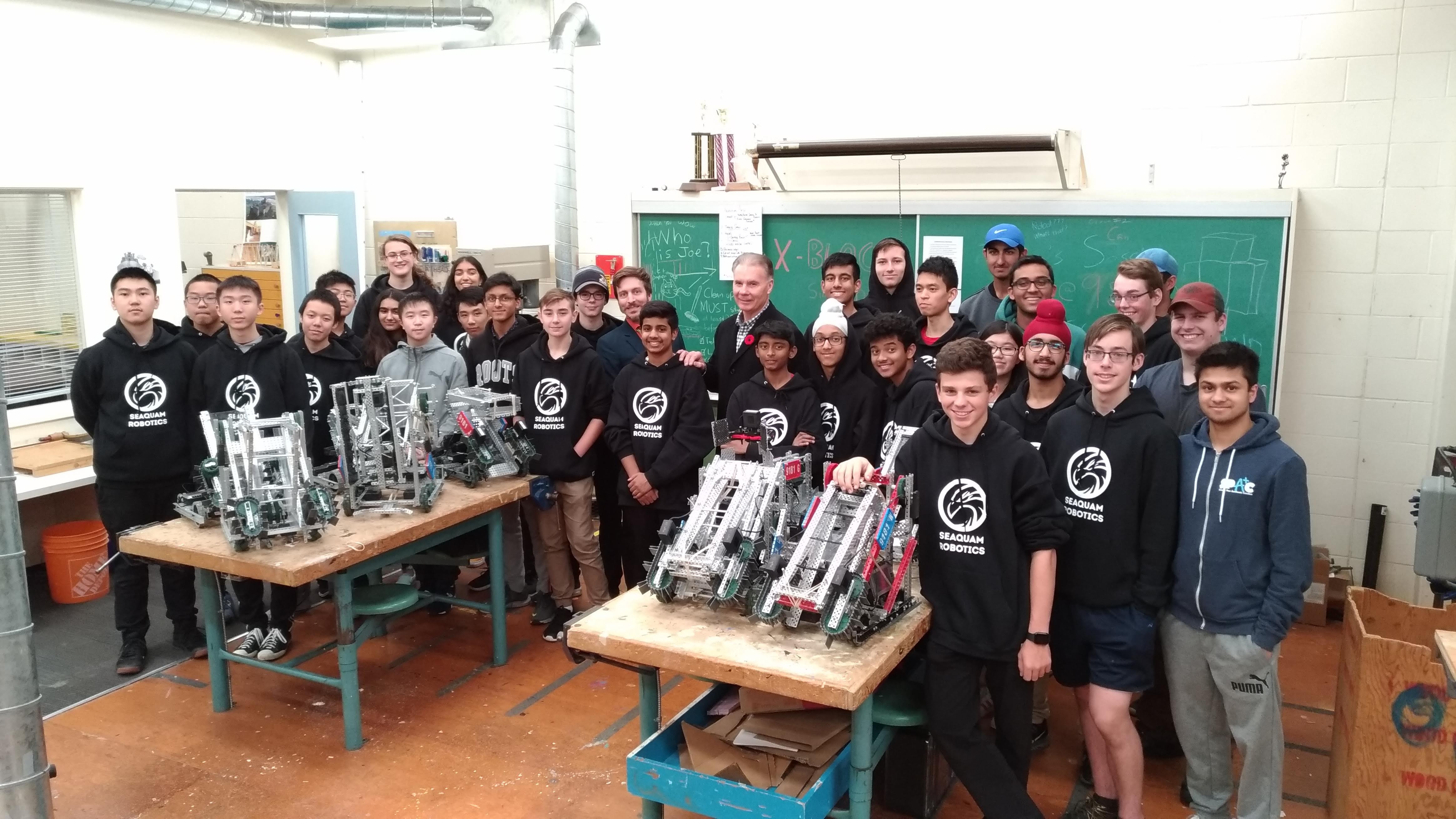 Photo of Seaquam Robotics members with Delta mayor